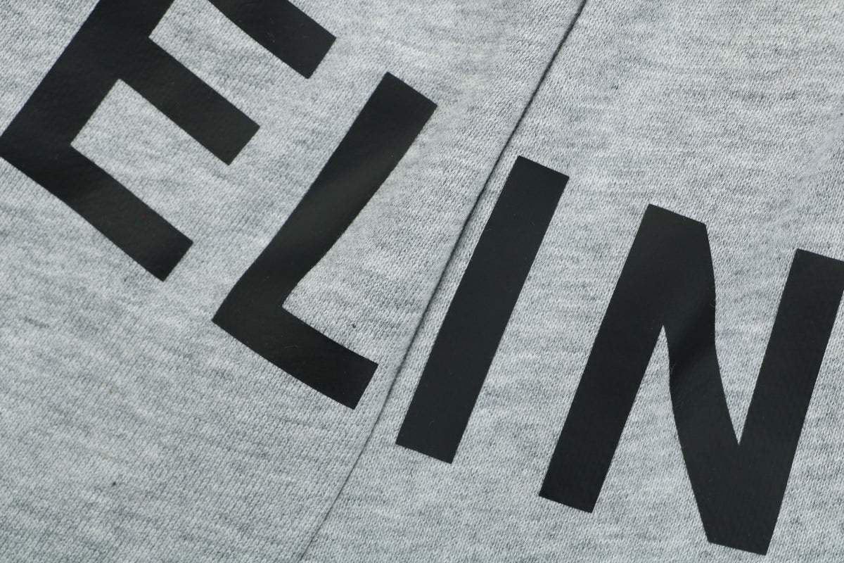 Celine Oversized Wordmark Logo Print Drawstring Shorts — Grey