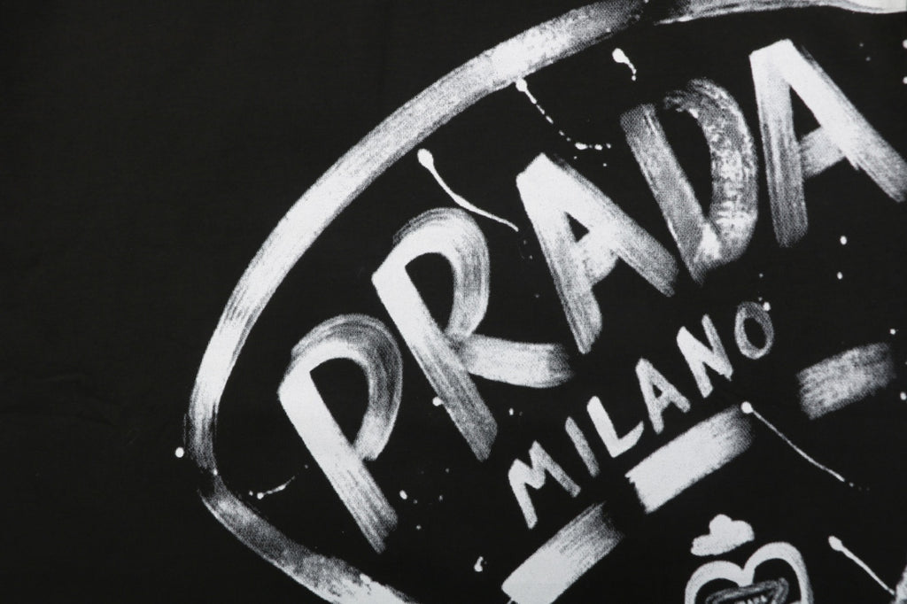 Prada Graffiti Shield Logo Print Long Sleeve T-Shirt | Black | PRA-GRF-SHD-LGO-PRT-LS-TSH-BLK