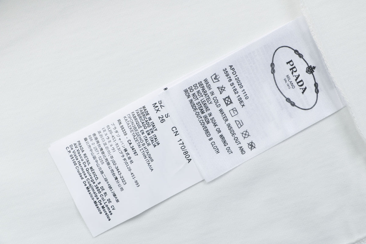 Prada Graffiti Shield Logo Print Long Sleeve T-Shirt | White | PRA-GRF-SHD-LGO-PRT-LS-TSH-WHT