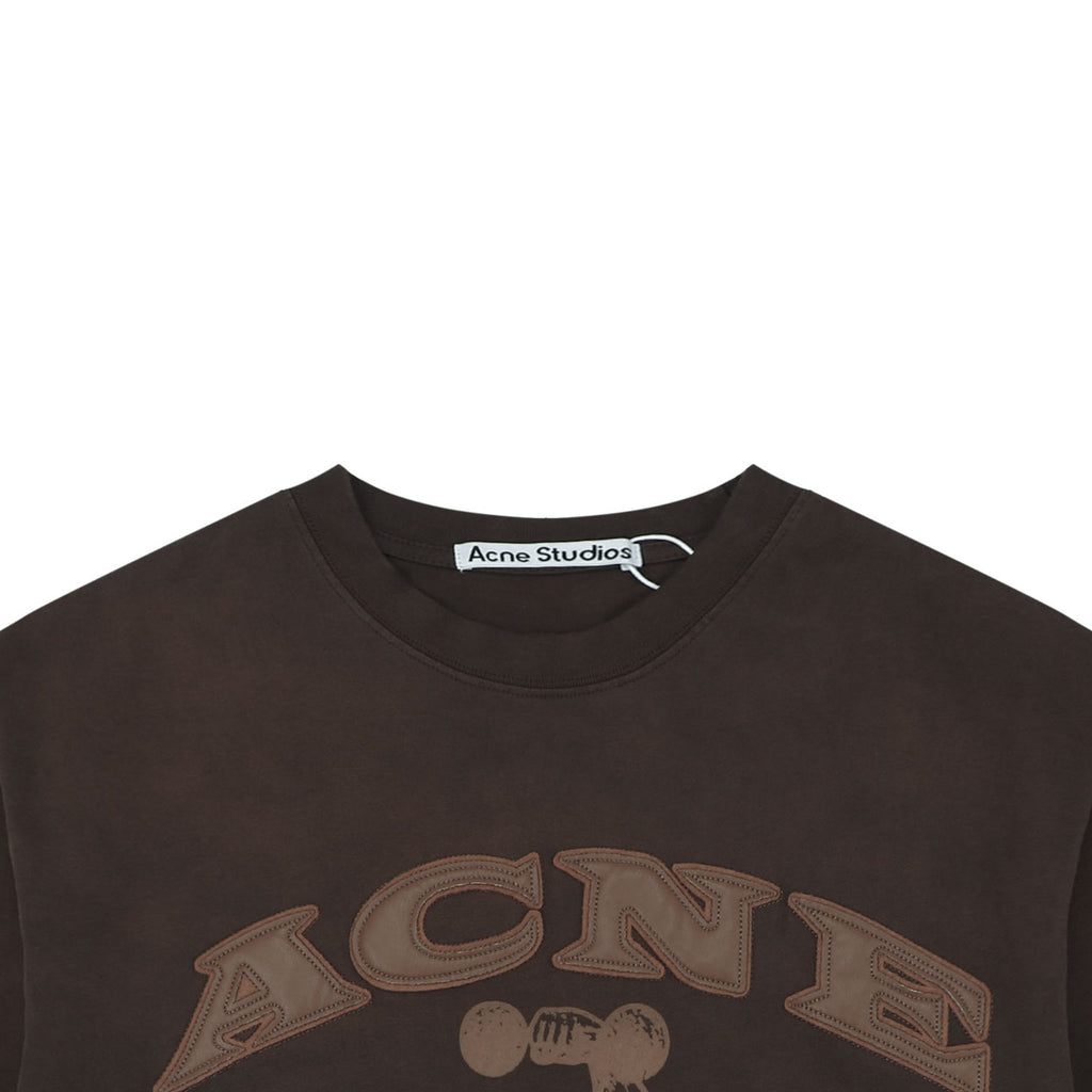 Acne Studios Arched Appliqué Letter Graphic T-Shirt in Dark Brown
